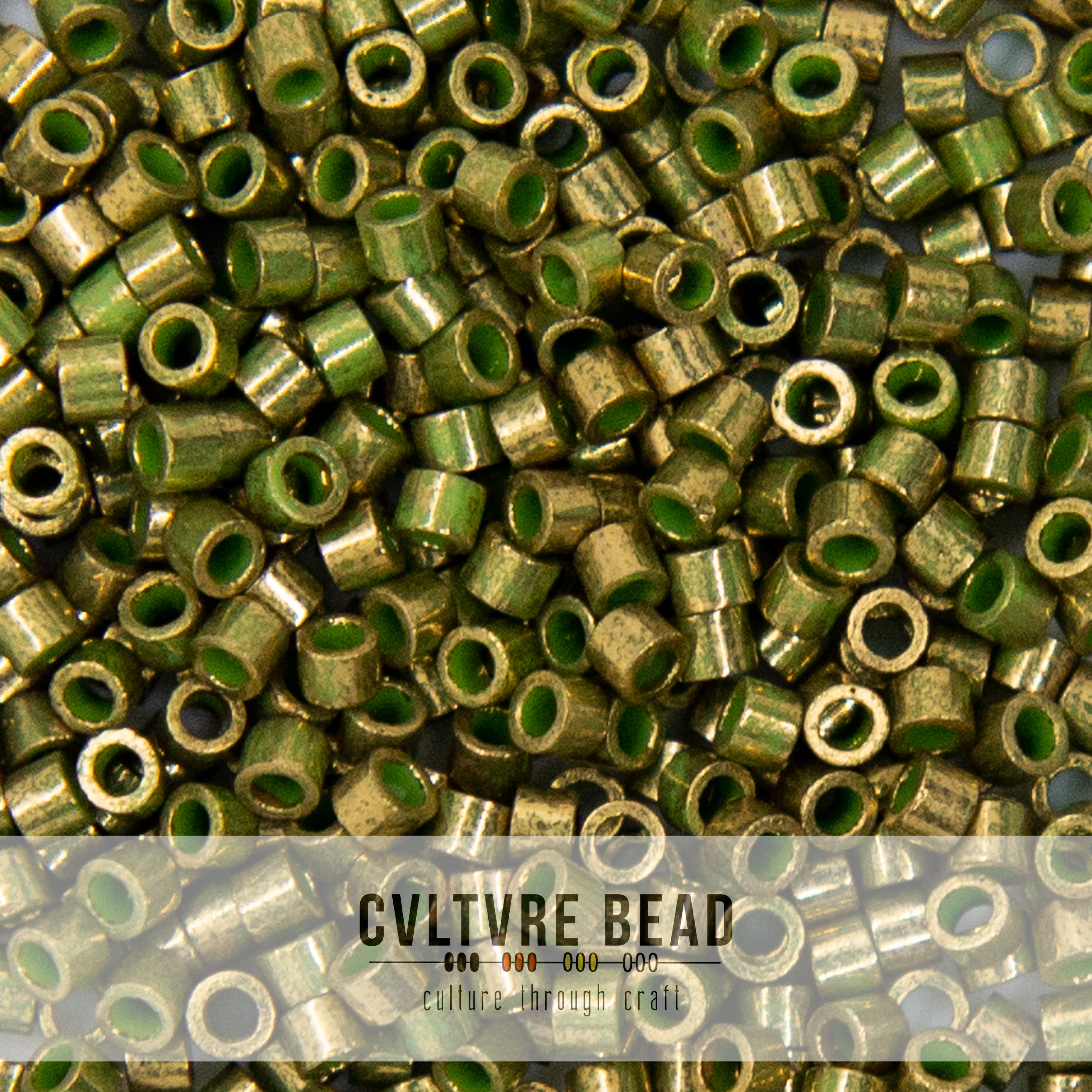 Toho Aiko 11/0 - 4g - Gilded Marble Green